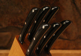 Set di coltelli da tavola con ceppo in muflone