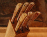 Set di coltelli da tavola con ceppo in montone