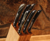 Set di coltelli da tavola con ceppo in muflone